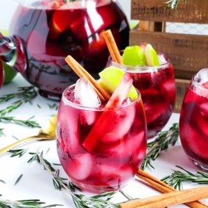 Spiced Harvest Fall Sangria made with apples, pears, plums, cinnamon & spices, perfect for Autumn and Thanksgiving Holiday Parties. #fall #fallsangria #autumnsangria #thanksgivingcocktail