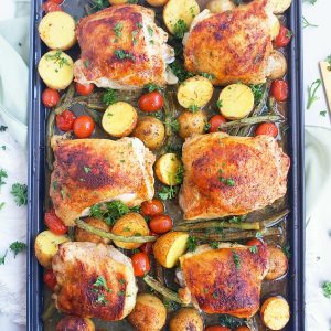 Sheet-Pan Lemon Basil Roasted Chicken & Vegetables made with Marie’s Market Reserve Meyer Lemon Basil Dressing. Perfect easy, weeknight sheet pan meal. #healthysheetpanmeals #sheetpanmeals #lemonchicken #chickenandvegetables #healthydinnerrecipes