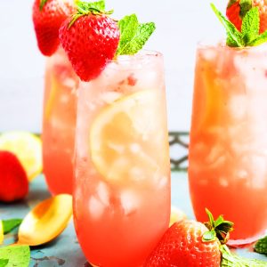 This simple strawberry mint gin & tonic cocktail is the perfect spring and summer refreshment! It’s subtly sweet, tart, and earthy. It’s a cocktail that everyone will surely enjoy. beautifuleatsandthings.com #cocktails #summer #strawberry #mint #gin #lemon