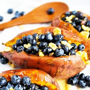 Blueberry & Walnut Stuffed Sweet Potatoes made with baked sweet potatoes, fresh blueberries, walnuts, and honey. beautifuleatsandthings.com