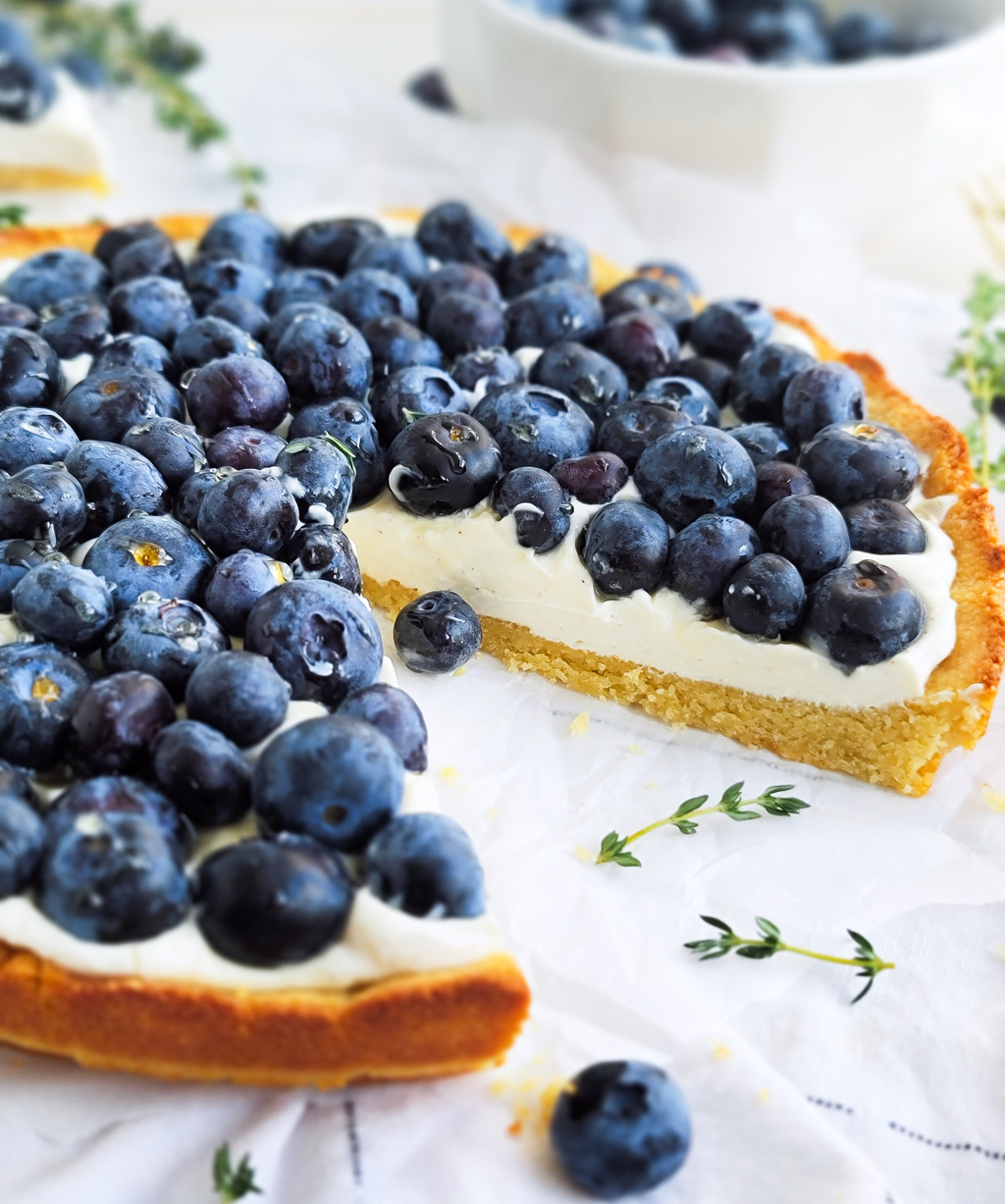 Low Carb Blueberry Cream Tart made with a low carb almond flour crust, with blueberries on top beautifuleatsandthings.com