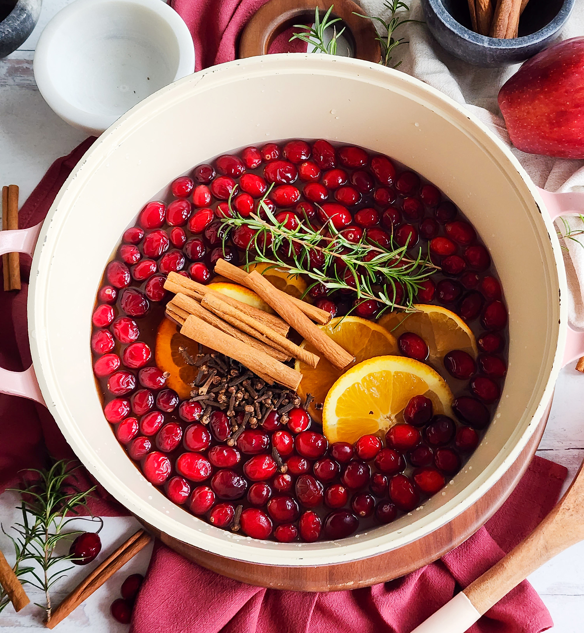 easy DIY Christmas Morning Stovetop Potpourri with orange slices, cinnamon sticks, cranberries beautifuleatsandthings.com