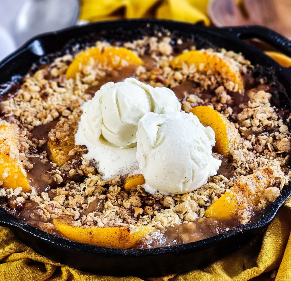 bourbon peach crisp in a cast iron skillet beautifuleatsandthings.com
