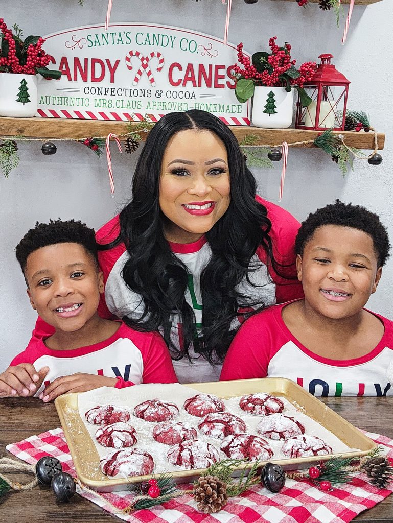Quick Red Velvet Cake Mix Cookies, black mom with black sons, with holiday scenery in the background
beautifuleatsandthings.com