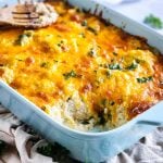 Budget-Friendly Cheesy Chicken & Broccoli Casserole for under $15 cooked in a light blue baking dish beautifuleatsandthings.com