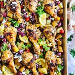Sheet Pan Greek Chicken & Potatoes on a gold sheet pan. Easy weeknight meals for busy moms beautifuleatsandthings.com