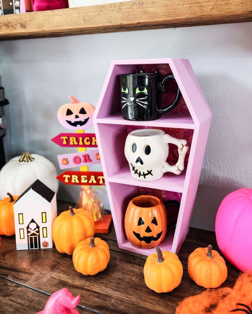 Groovy Halloween Coffee Bar or Boo Bar decorated with pink, orange, and purple bold colors
beautifuleatsandthings.com