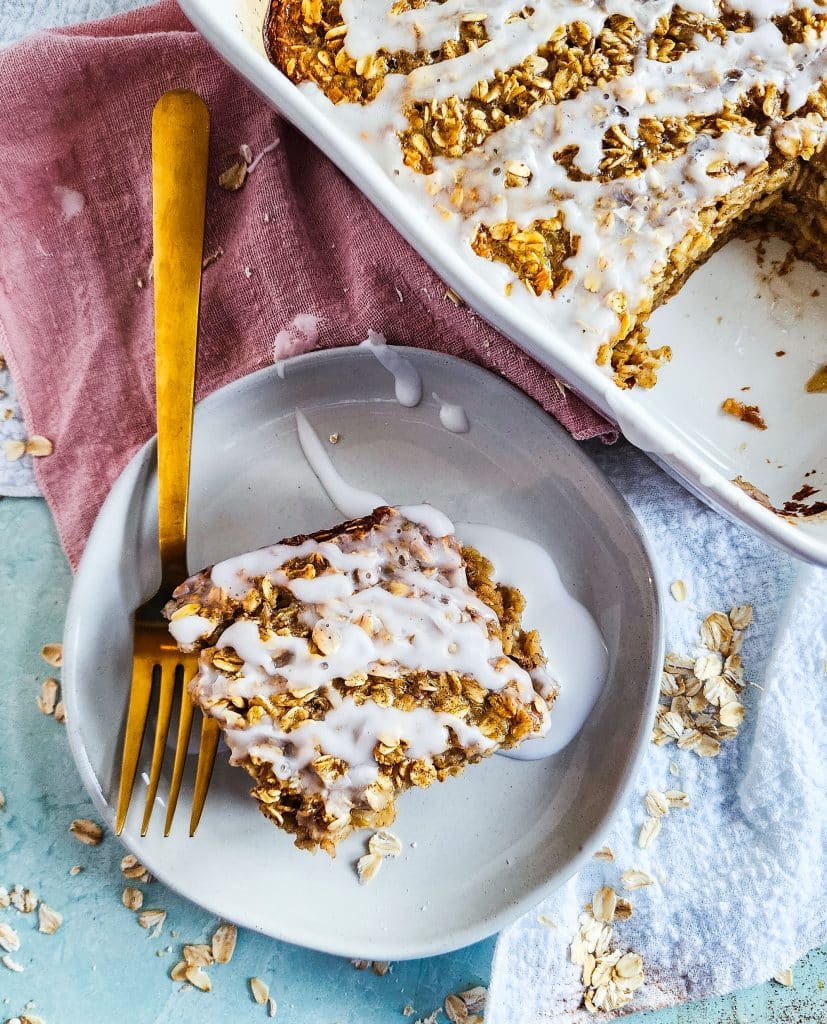 cinnamon roll baked oatmeal topped with a white icing, perfect for meal prep
beautifuleatsandthings.com