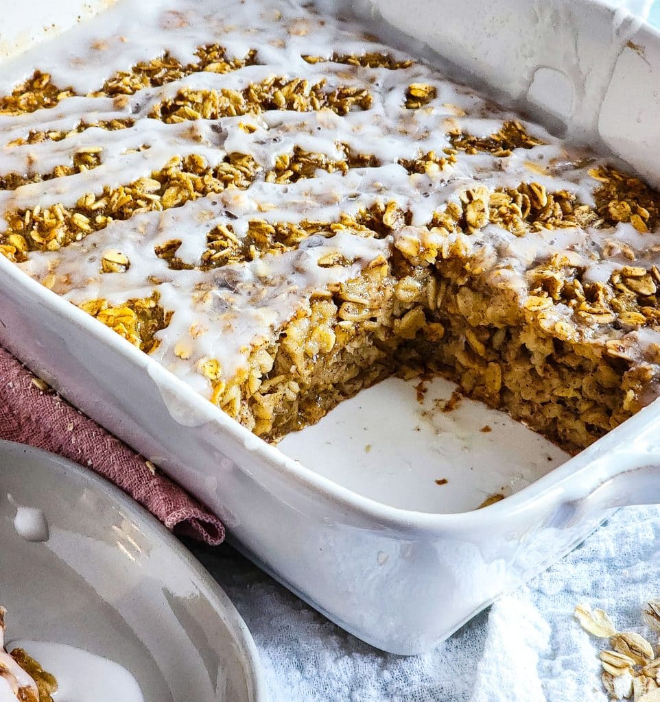 cinnamon roll baked oatmeal topped with a white icing, perfect for meal prep
beautifuleatsandthings.com