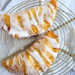 fried peach hand pies made with canned peaches and pre made pie dough, and powdered sugar icing beautifuleatsandthings.com