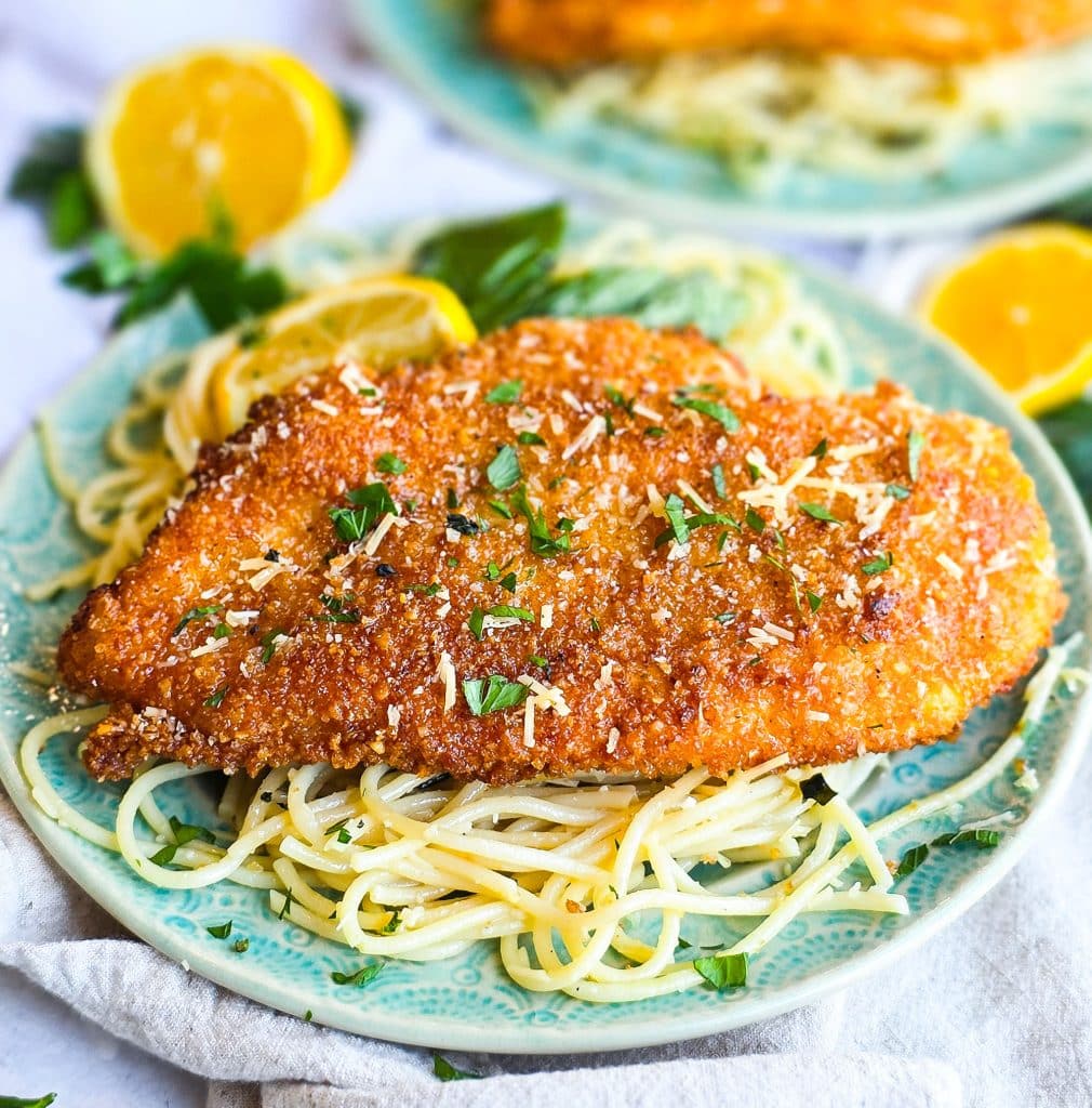 Crispy Fried Parmesan Crusted Chicken with Lemon Butter Basil Pasta on a blue plate, easy dinner meals
beautifuleatsandthings.com