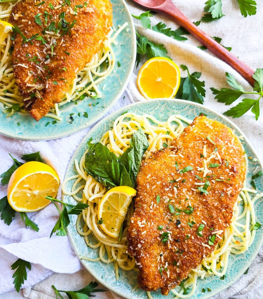 Crispy Fried Parmesan Crusted Chicken with Lemon Butter Basil Pasta on a blue plate, easy dinner meals
beautifuleatsandthings.com