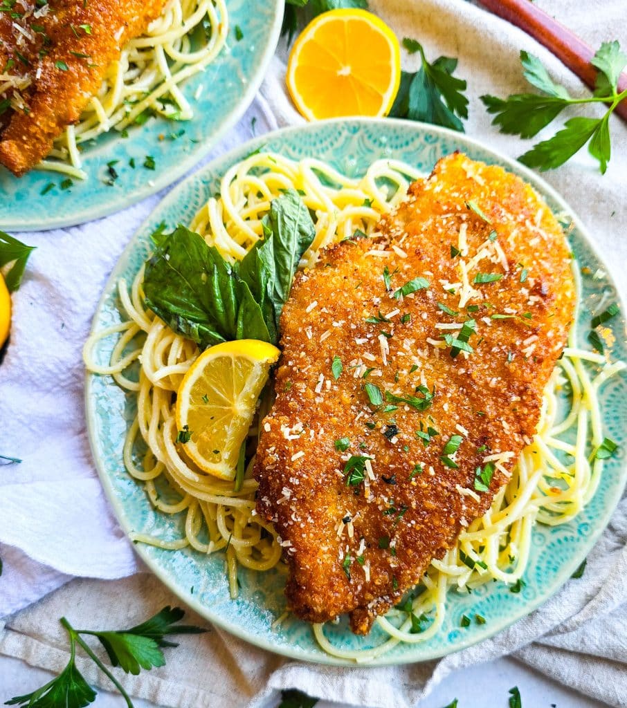 Crispy Fried Parmesan Crusted Chicken with Lemon Butter Basil Pasta on a blue plate, easy dinner meals
beautifuleatsandthings.com