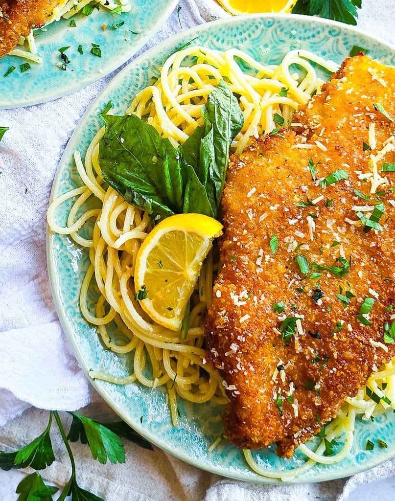 Crispy Fried Parmesan Crusted Chicken with Lemon Butter Basil Pasta on a blue plate, easy dinner meals
beautifuleatsandthings.com