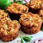 Cheesy Sausage Breakfast Muffins on a white cutting board, made with Bisquick beautifuleatsandthings.com