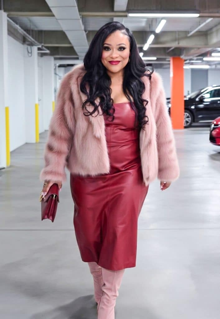 Affordable Holiday Outfits That Look Expensive-Plus Size Edition, Curvy Black Dietitian Shares tips on outfit inspo for the holidays-Red leather midi dress, pink faux fur coat, pink boots
beautifuleatsandthings.com