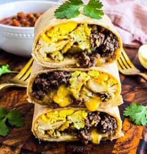 Turkey sausage breakfast burritos with eggs, roasted potatoes, ground turkey and cheese beautifuleatsandthings.com